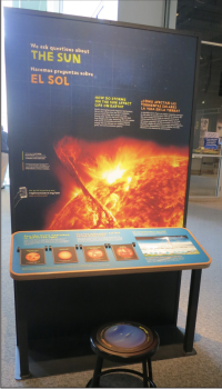 Single exhibition component, there is a large graphic that says The Sun with a NASA closeup image of the Sun.