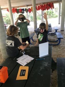 young learners using a component of the Moon Adventure Game