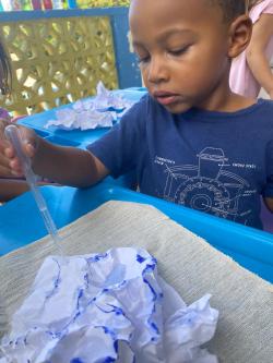 Young learner experimenting with the Paper Mountains activity