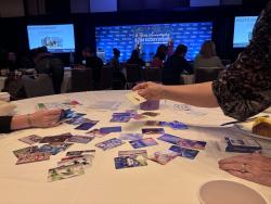 What is Learning cards spread out on a table at STEM Ecosystems convening October 2025
