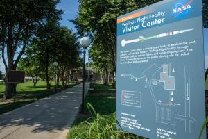 NASA’s Wallops Flight Facility Visitor Center front of building rocket garden sign