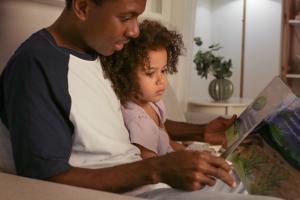 Father Daughter reading a picture book together (Free Stock Image Credit -Family First via StockSnap)