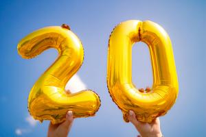 The number 20 in mylar balloons photo by Matthew Ball on Unsplash
