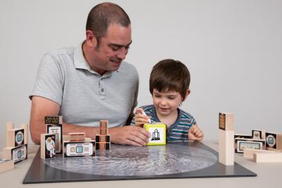 Facilitator and Learner arrange blocks on a Lunar crater map