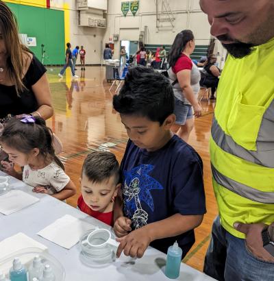 Kids make gummy capsules for a mRNA vaccine activity