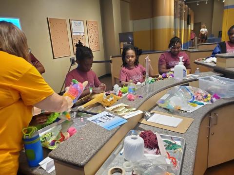 Frankenstuffs Activity Resources Across Lab Countertop with Young Participants