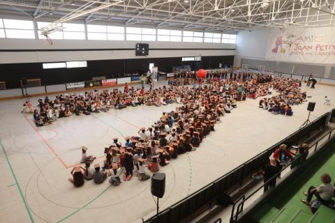 Students in a Gym Taking a Large Formation During Nano Festival