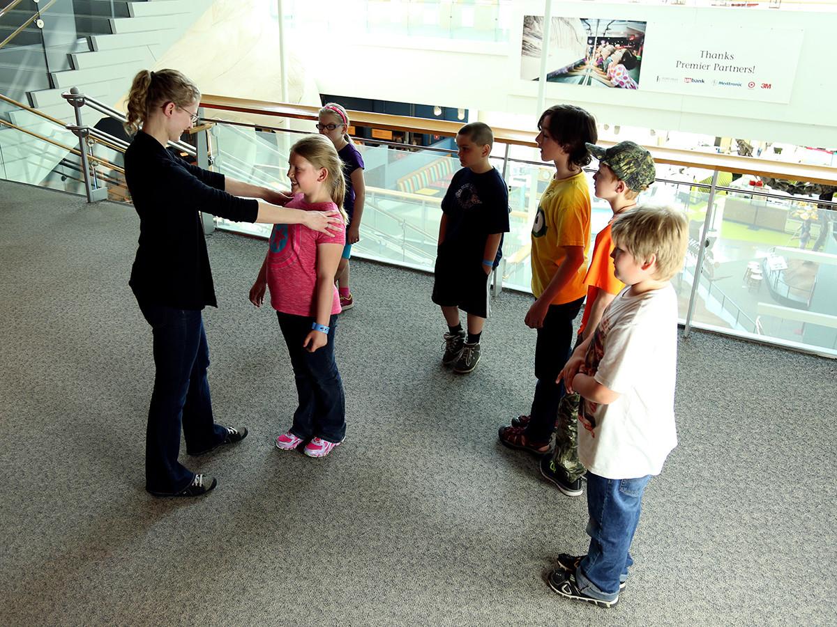 Image of kids lined up preparing for a game of Systems Scramble