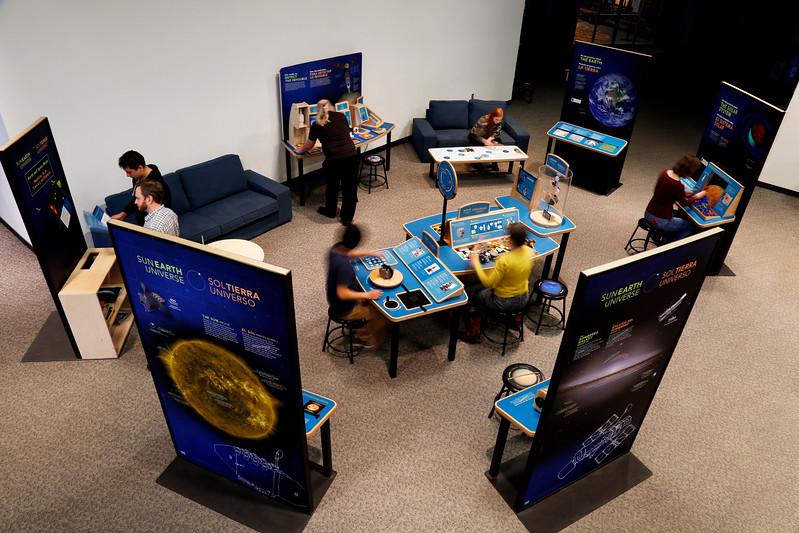 Sun Earth universe exhibition birdseye view