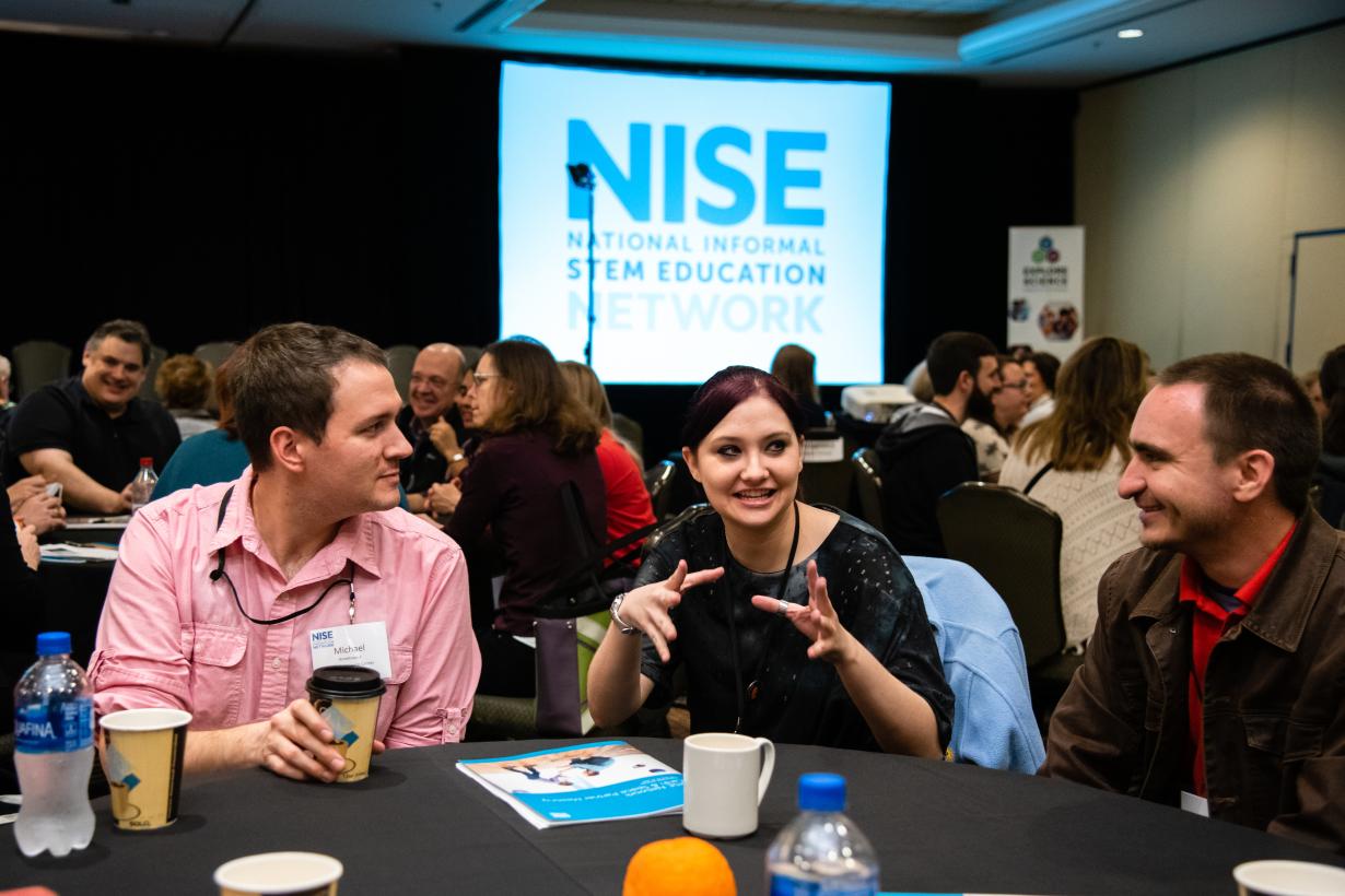 Professional talking at a conference