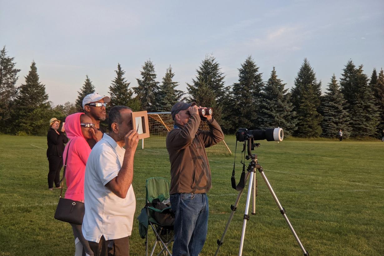 Guests at RMSC viewing the 2021 Partial Eclipse