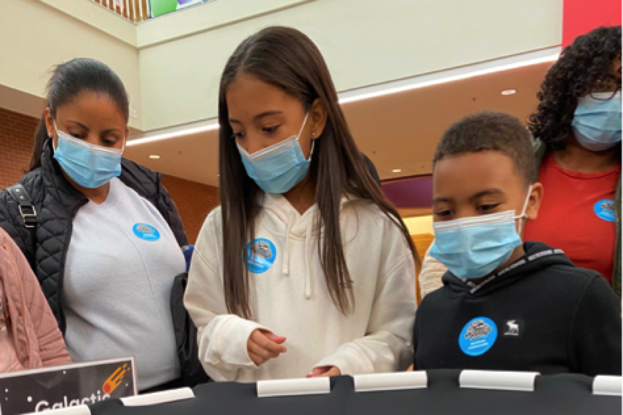 Marbles Kids Museum Webb Space Telescope Event visitors using Orbiting Objects activity