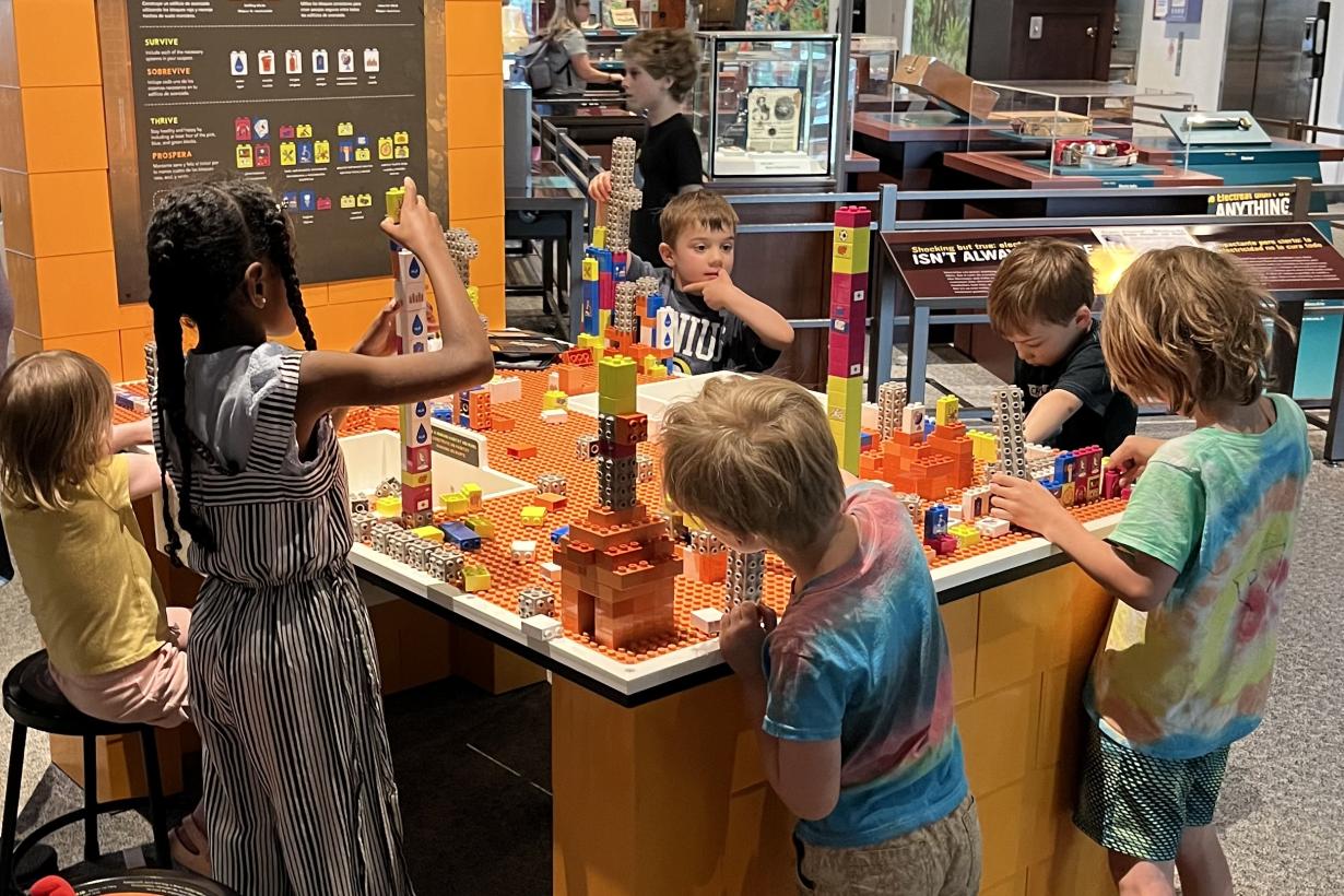 Build a Human Habitat on Mars - group of children building at exhibit