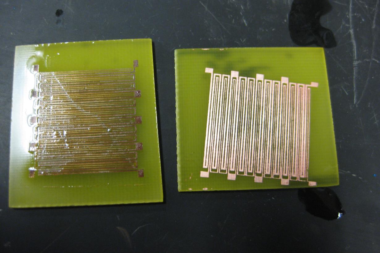 A circuit etched on a board using photolithography.