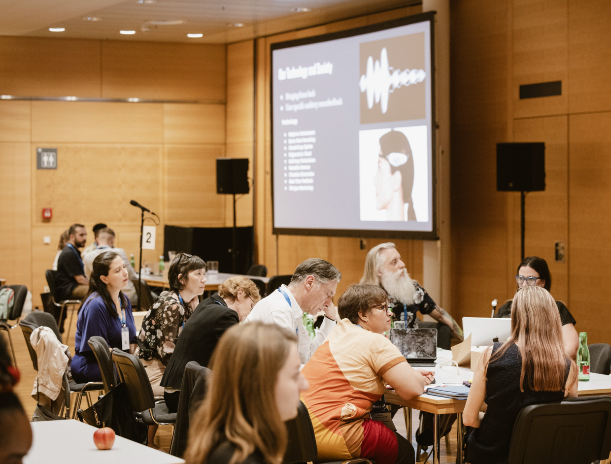 Neurotechnoogy Hackathon organizers and judges listen to the neurotechnology presentation from participants that included ethical considerations and governance strategies to address potential societal impacts