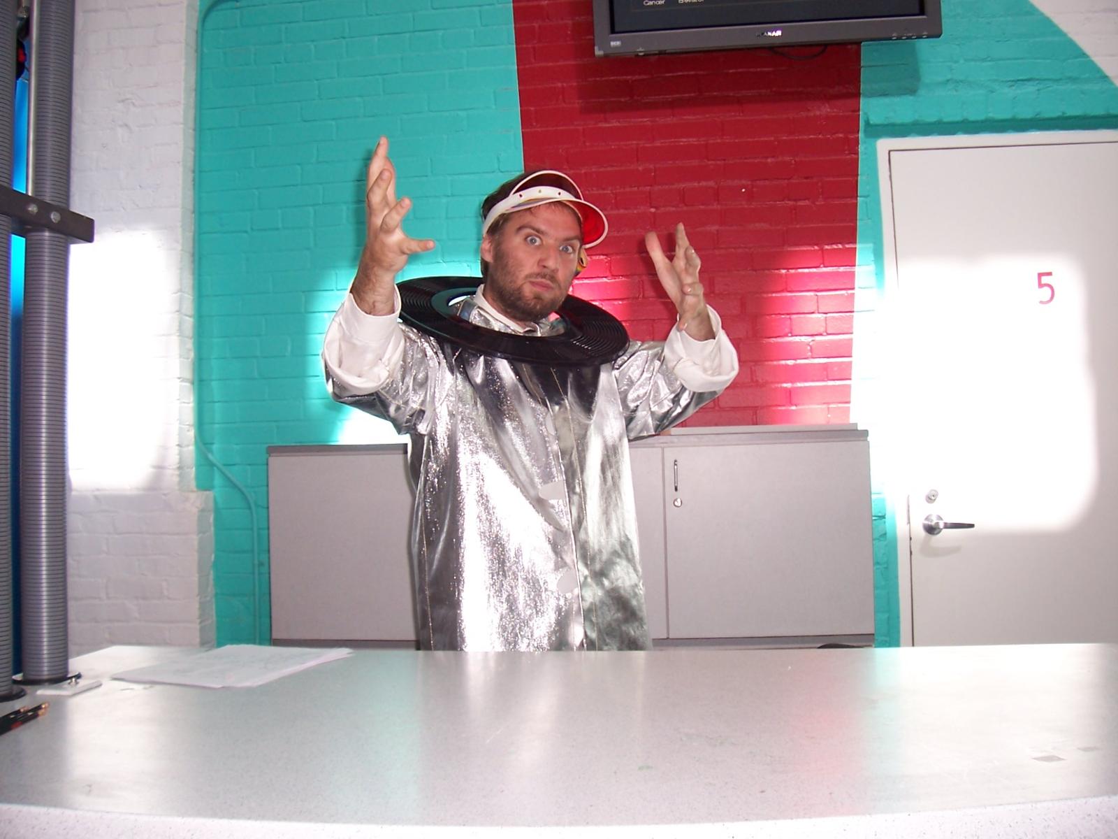 Facilitator with a visor in costume playing a role in the story