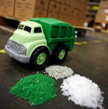 Closeup image of a toy truck made of recycled materials
