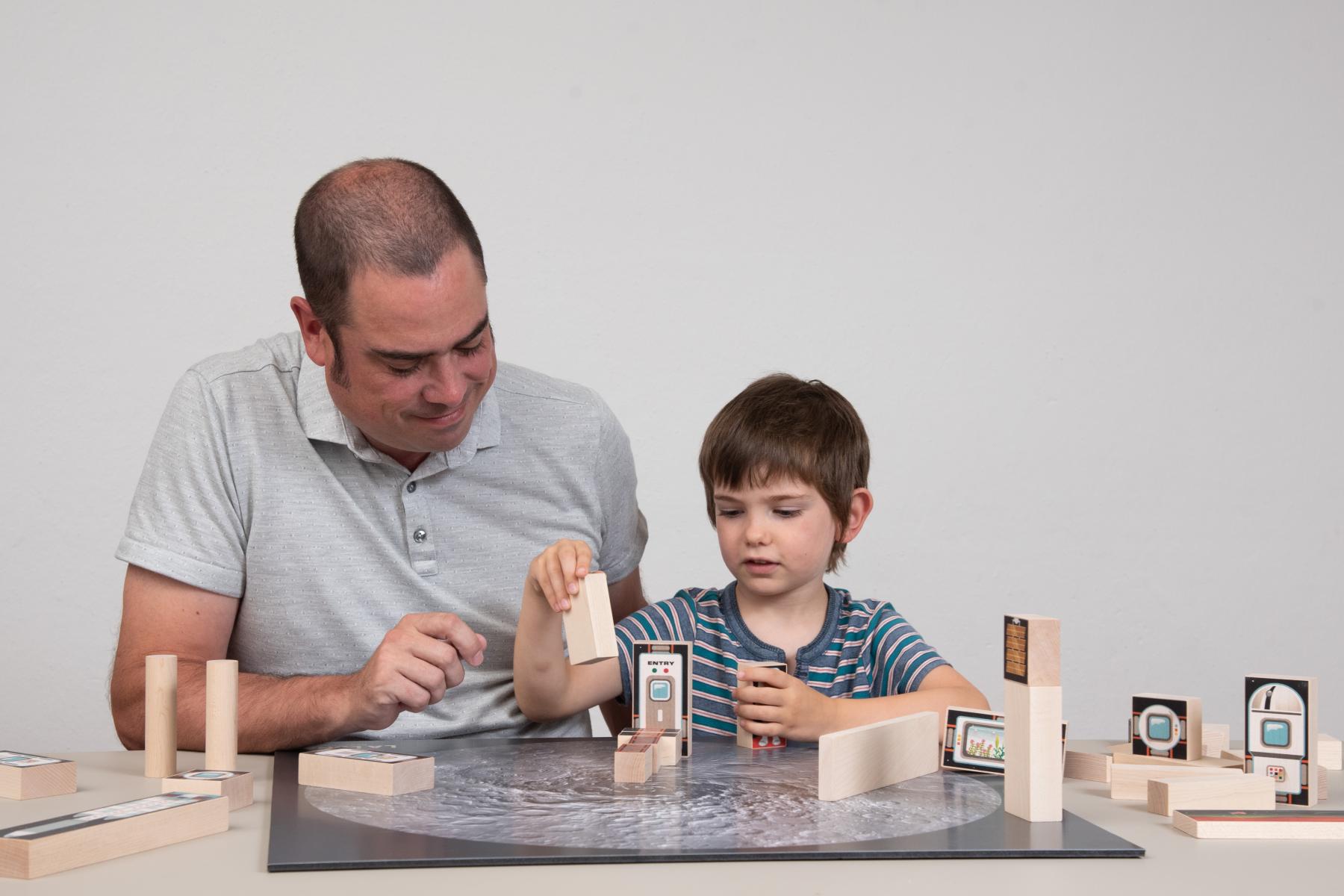 Facilitator and Learner arrange blocks on a Lunar crater map