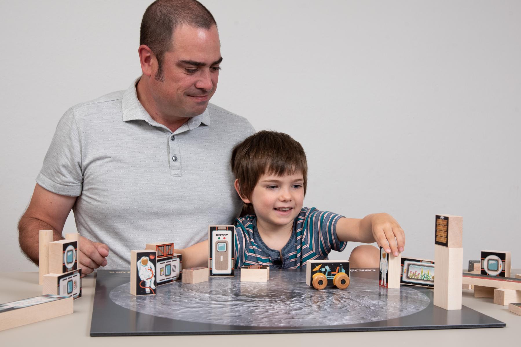 Facilitator and Learner arrange blocks on a Lunar crater map