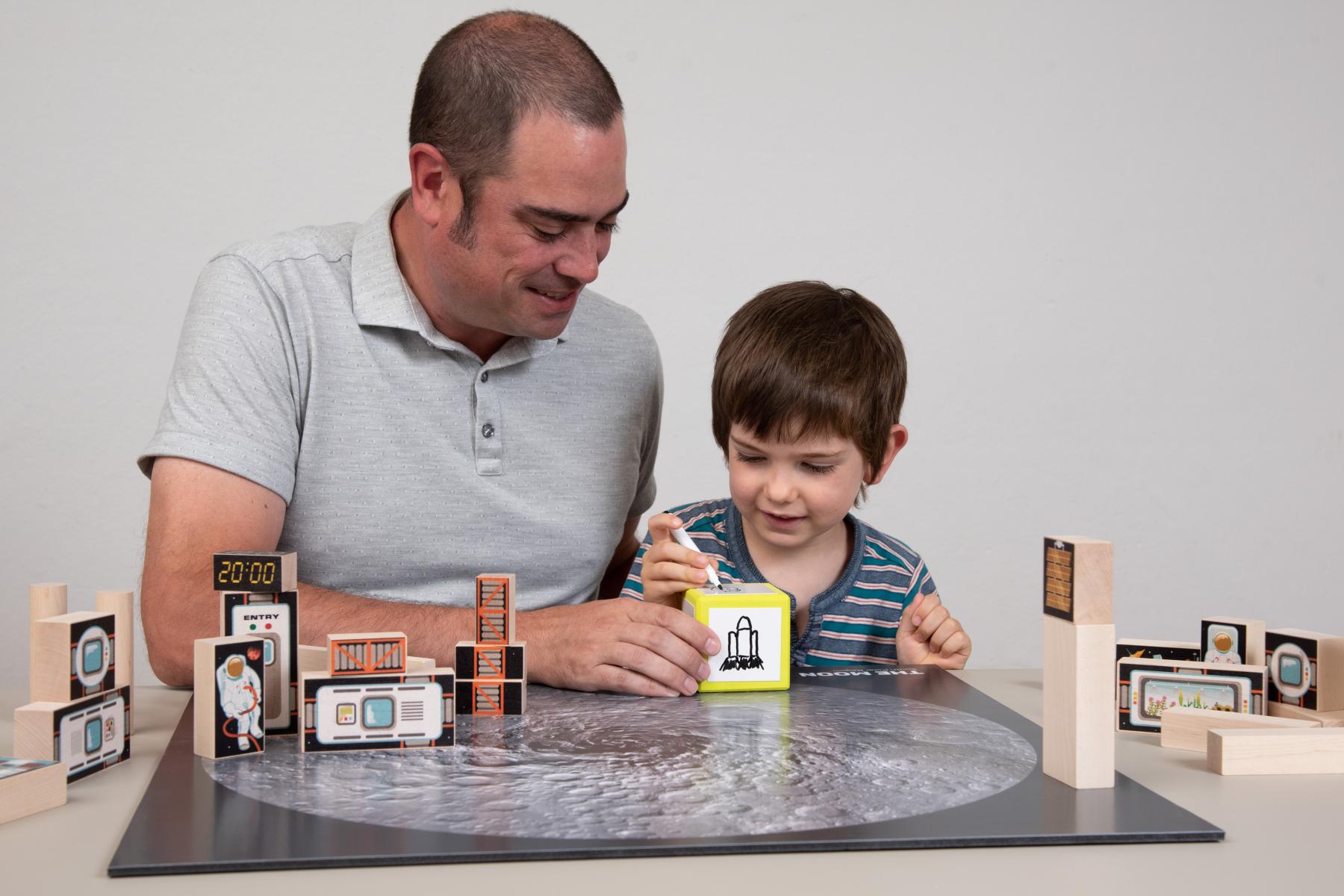 Facilitator and Learner arrange blocks on a Lunar crater map