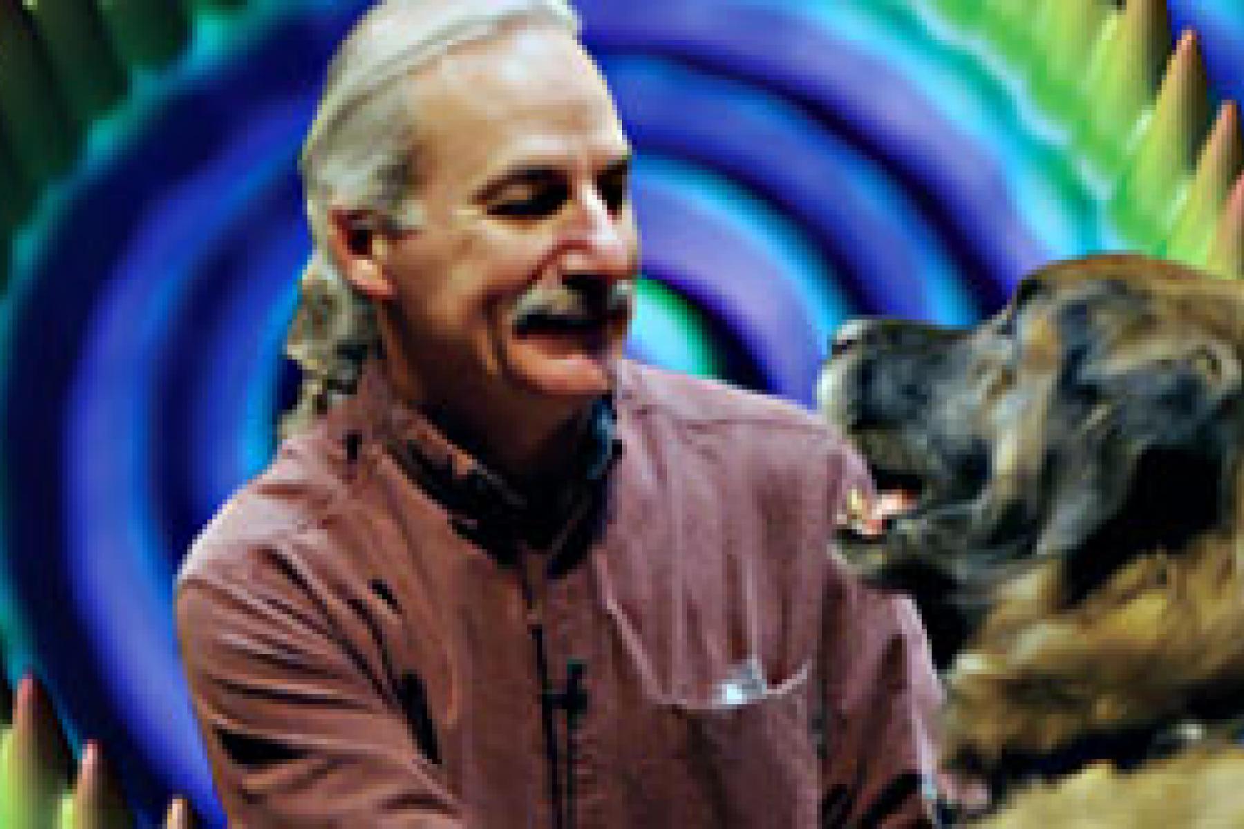 Man with a mustache interacts with a dog