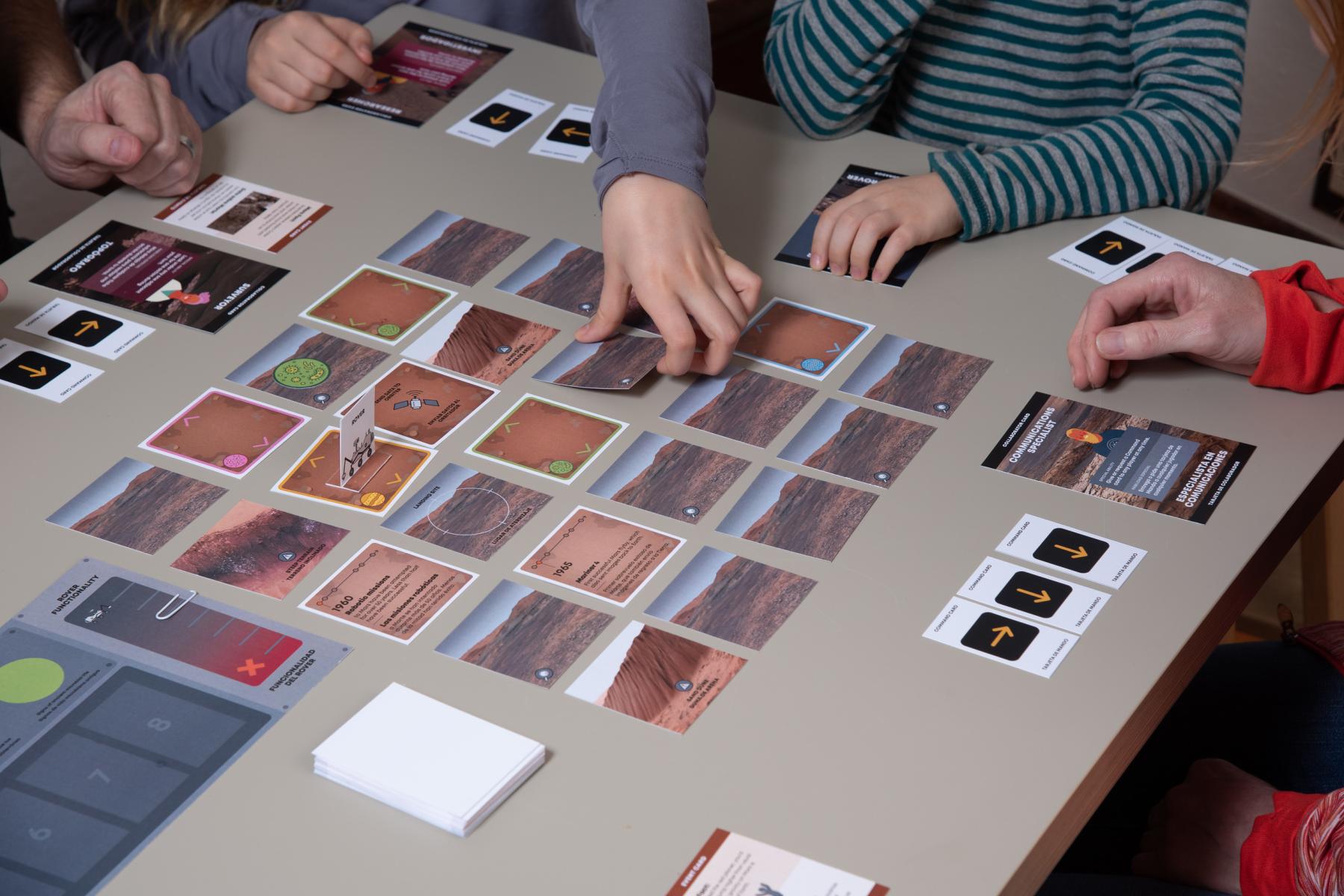 Family playing Mars rover board game