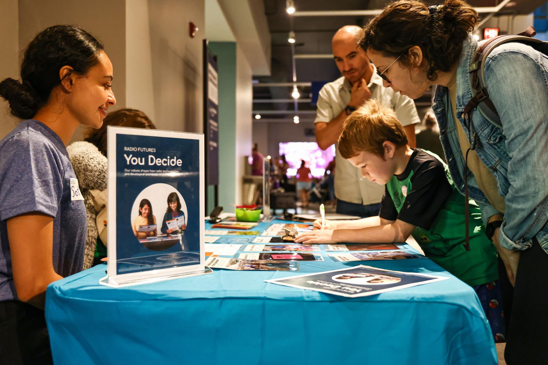 Making Waves You Decide activity at the Celebremos las ciencias! Let's Celebrate Science at the Museum of Life and Science Durham This event is part of the NC Science Festival credit Guillermo Delgado for NISE Network