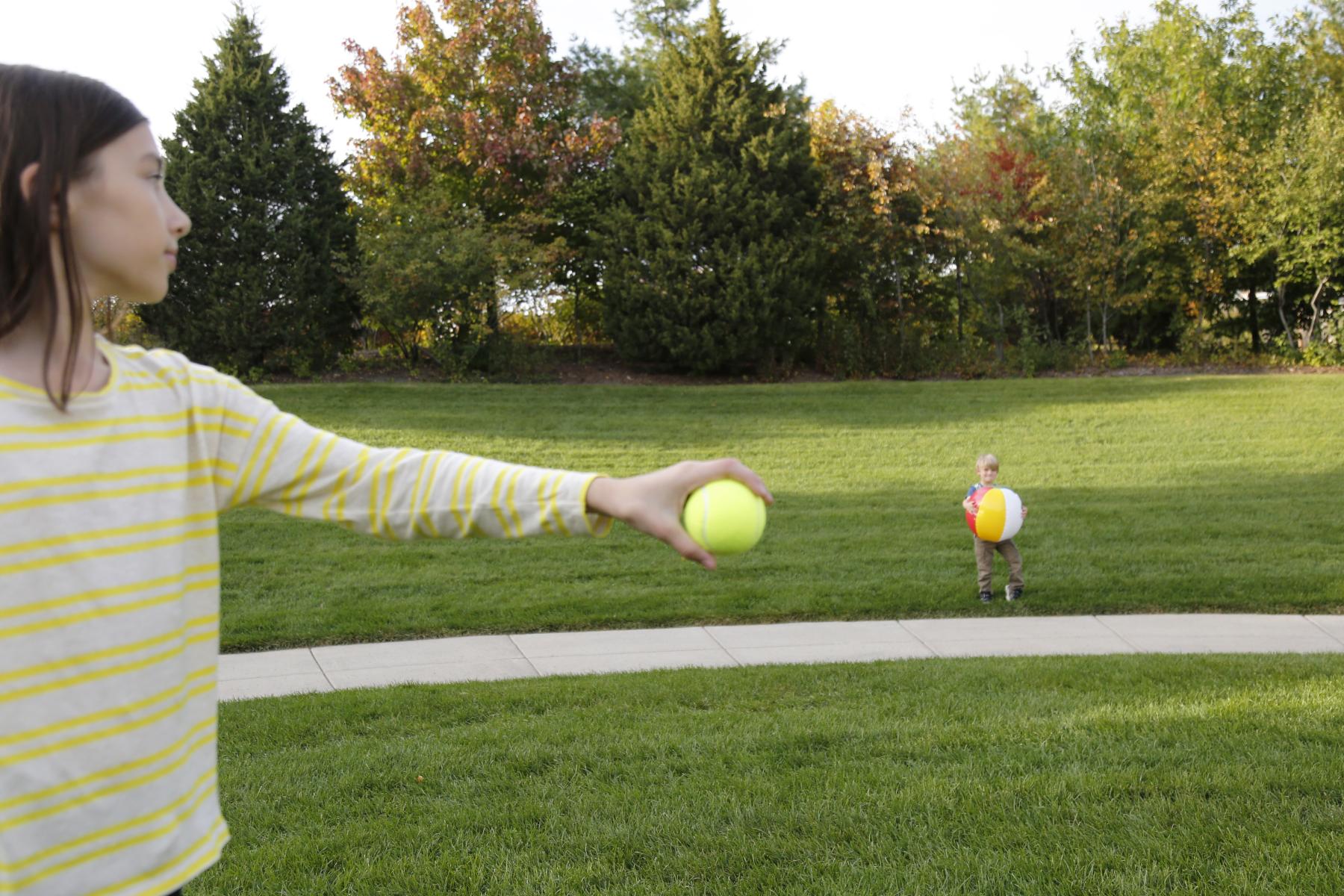 Big Sun Small Moon activity with children explores the concept of apparent size and allows visitors to experience this phenomena using familiar objects - a tennis ball and a beach ball