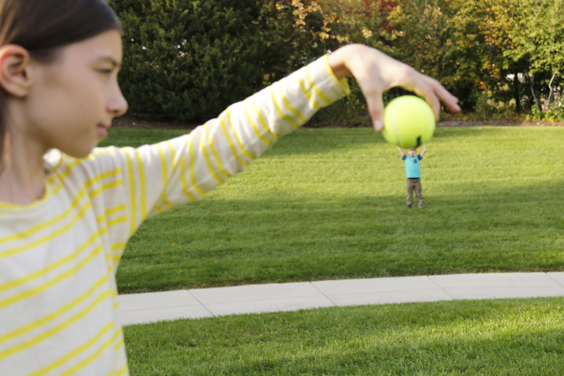 Big Sun Small Moon activity with children explores the concept of apparent size and allows visitors to experience this phenomena using familiar objects - a tennis ball and a beach ball