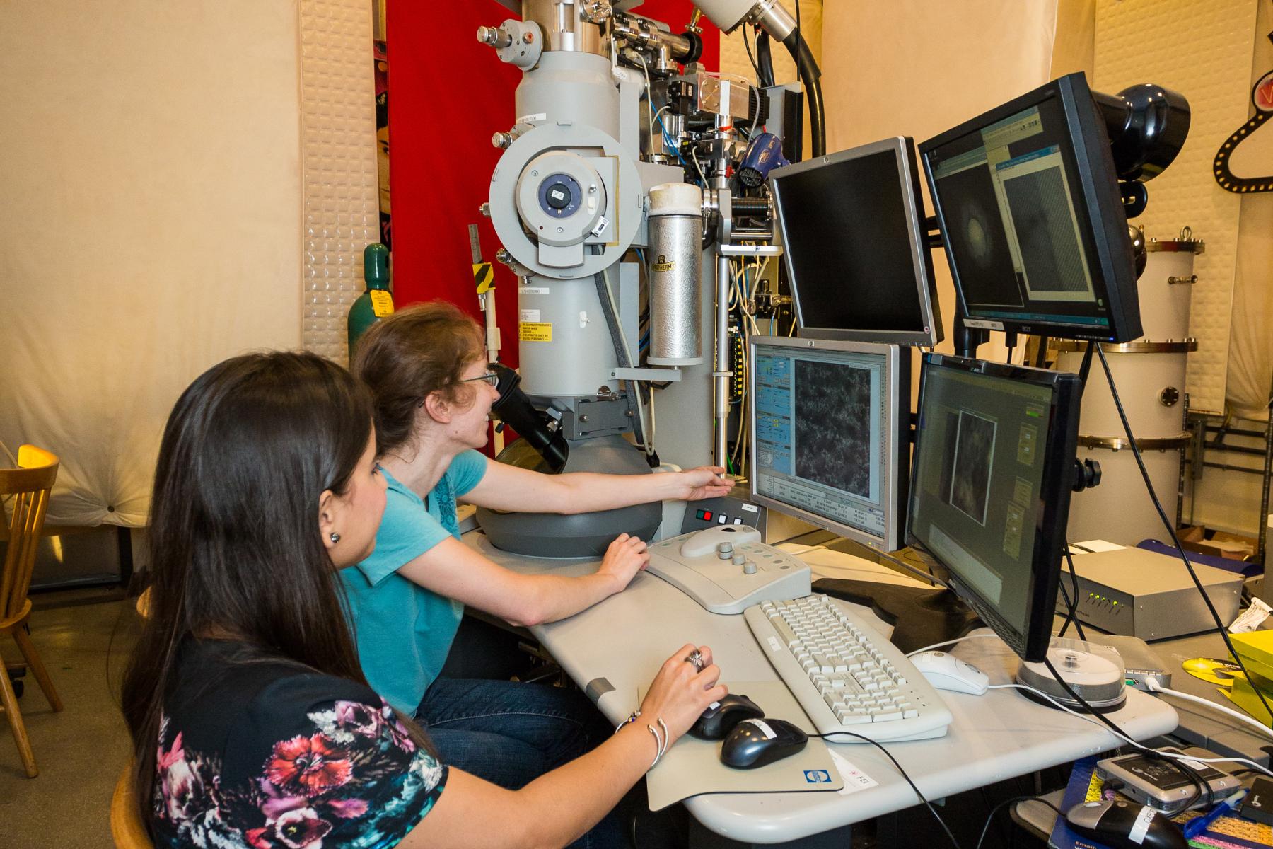 Scientist using an Transmission Electron Microscope (TEM)