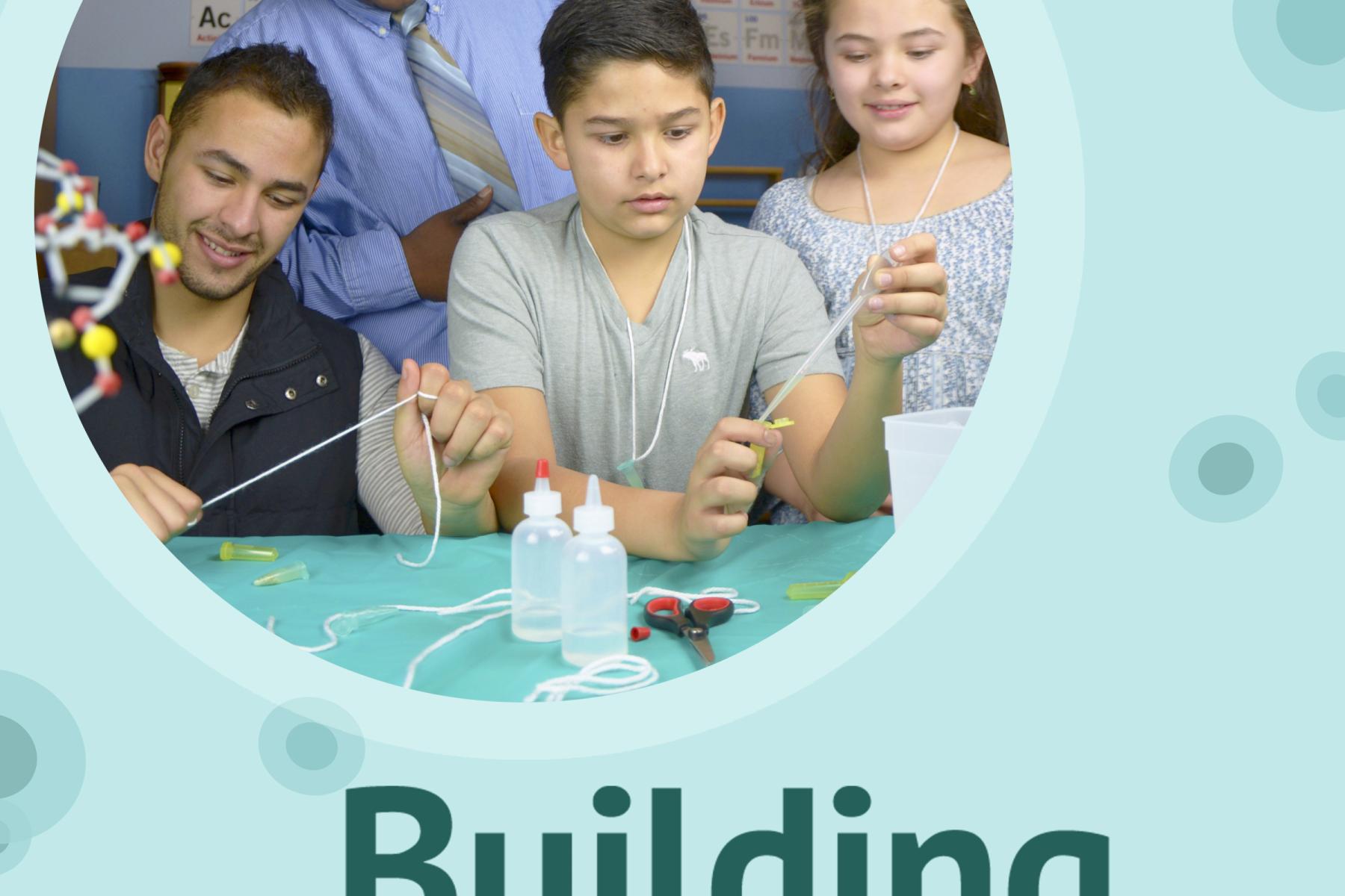 Cover photo of participants engaging in hands-on Building with Biology activity