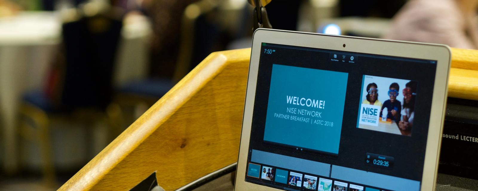 Photo of a laptop at the ASTC Partner breakfast